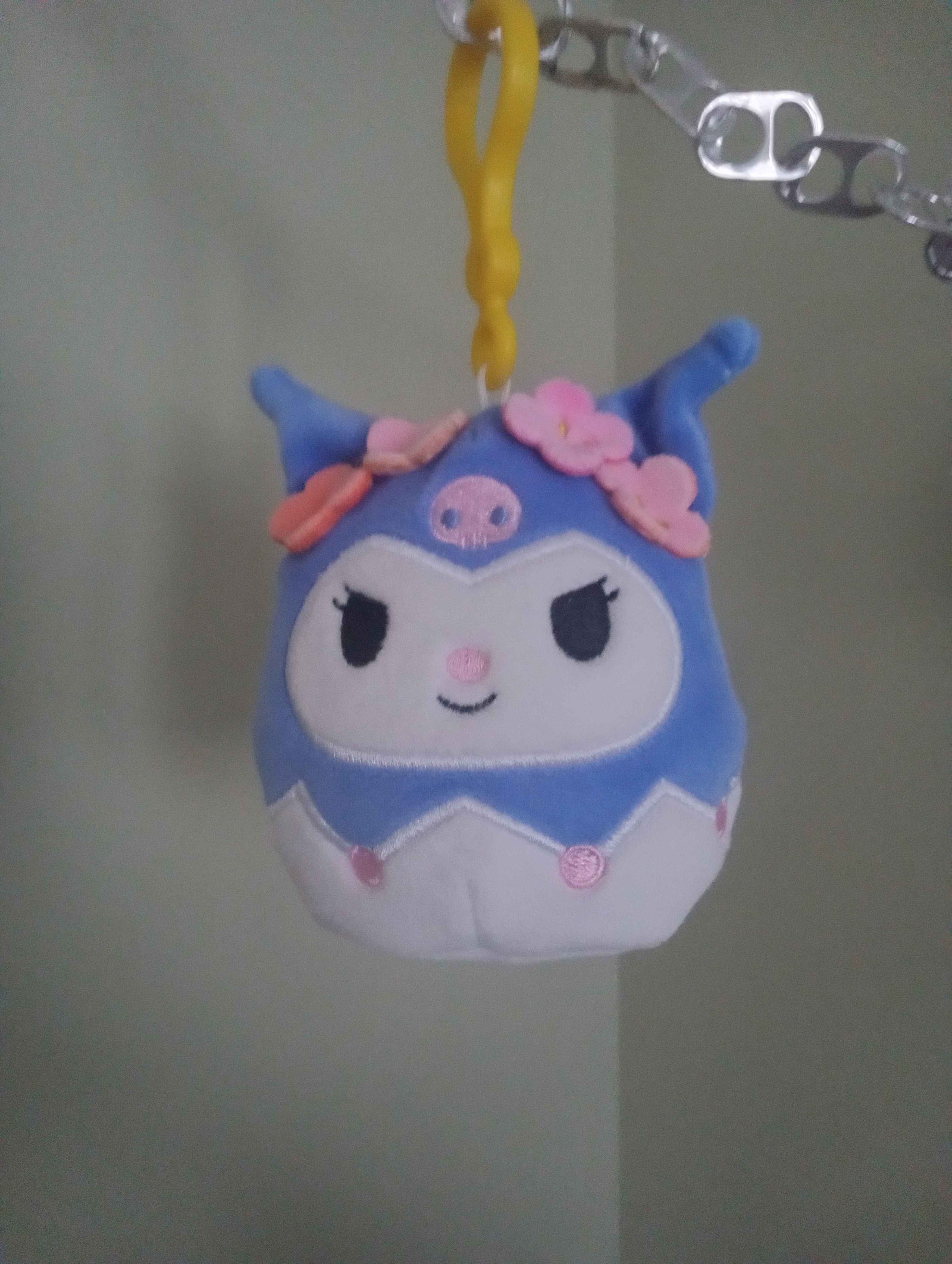 kuromi looking so adorned with beautiful flowers!! shes also a more blue purple which i haven't seen very much